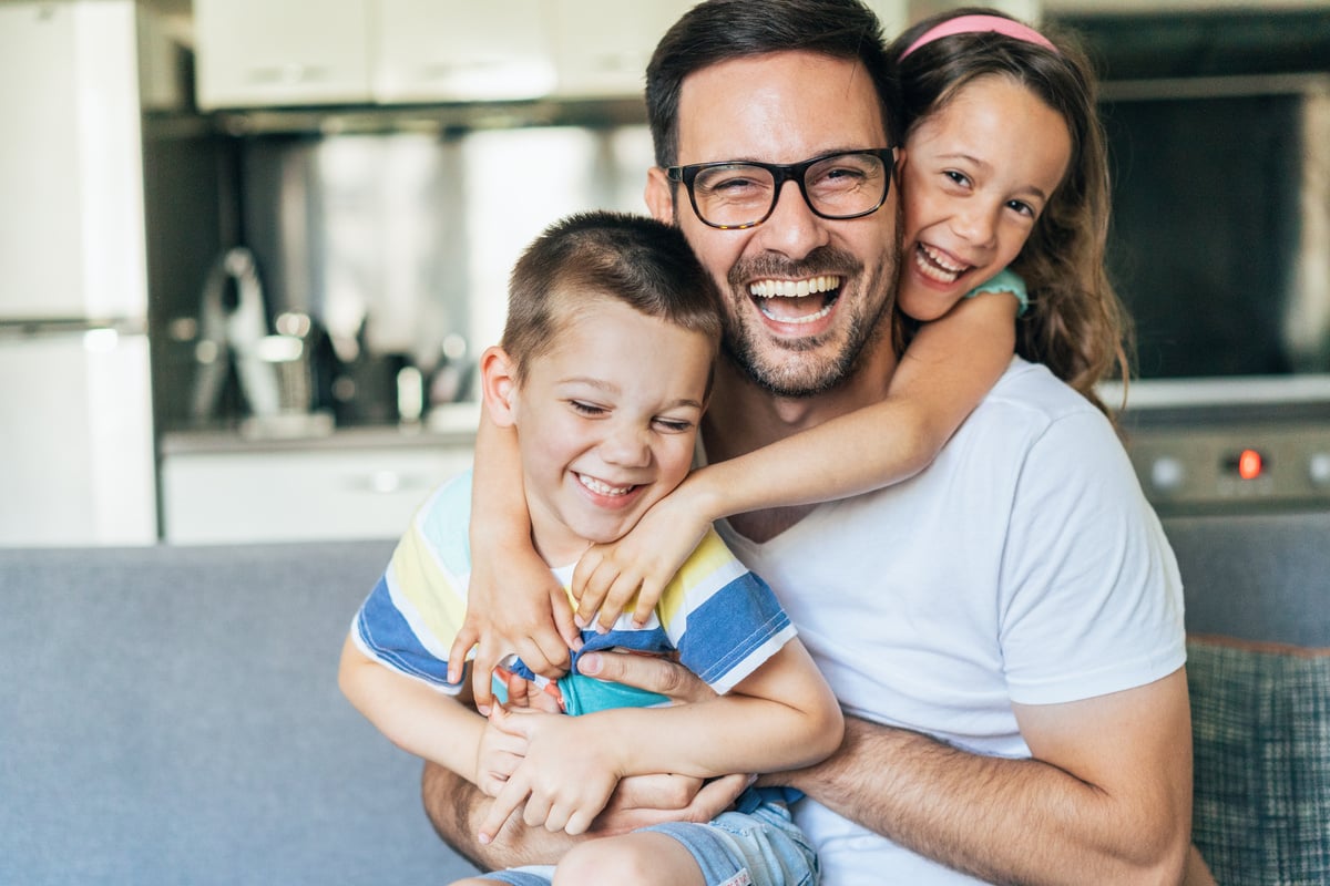 Portrait of father and children